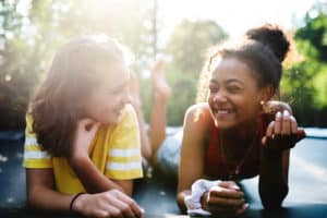 two girls benefit from adolescent mental health treatment programs