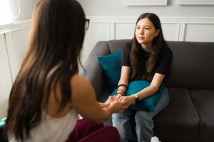 Two people engaged in interpersonal therapy