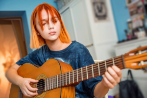 Person engaging in music therapy