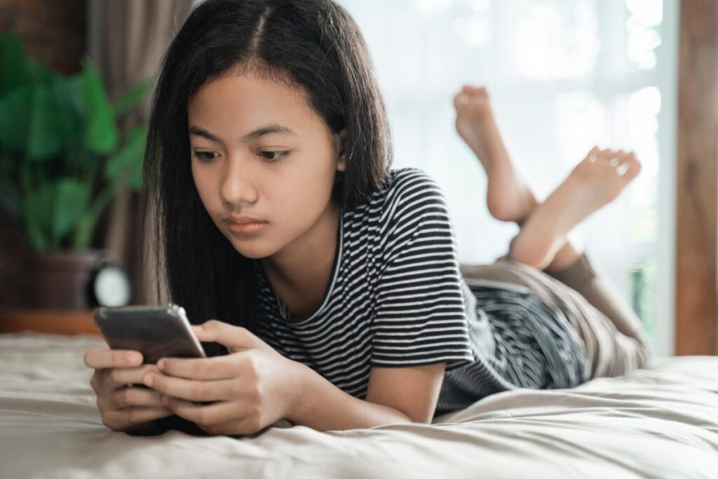Teenager experiencing negative effects from social media use