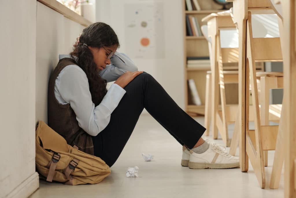 Person recognizing signs someone is struggling with trauma in themselves
